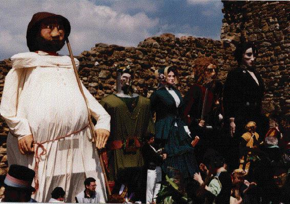 A row of giants standing against the castle wall